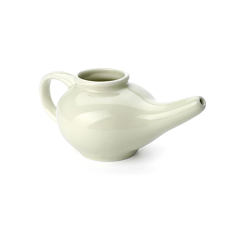 Light Green Ceramic Neti Pot on a White Background