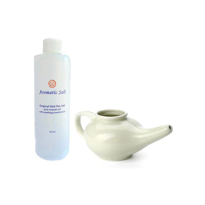 Scented Nasal Rinsing Kit Ceramic Neti Pot and Aromatic Scented Salt On a White Background